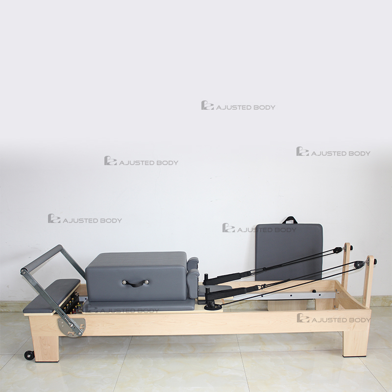 AdjustedBody maple Reformer — existing first-party equipment photograph